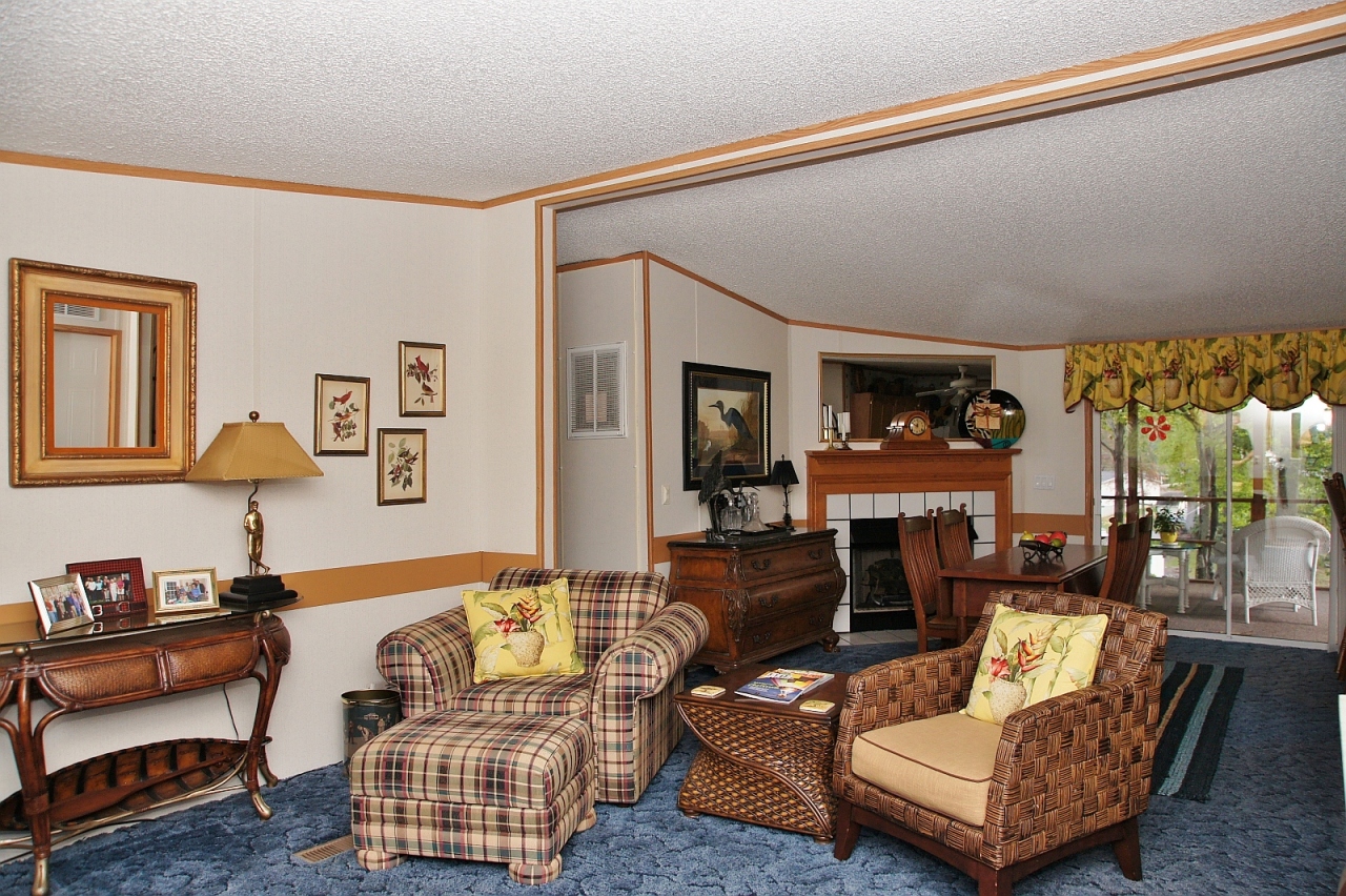 180 Cove Road Penhook, VA 24137 - Photo 9 of 33 a living room with furniture and a wooden floor