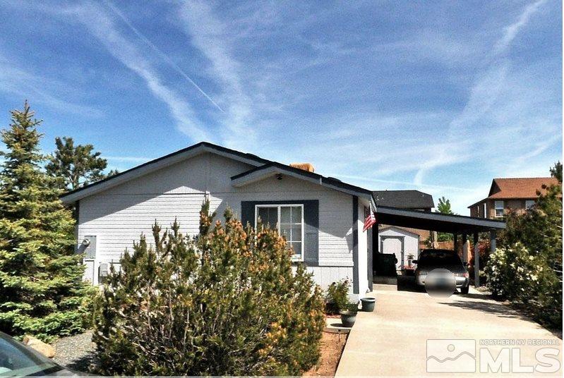 1317 Lynx Street Reno, NV 89506 - Photo 1 of 1 front view of house with a yard