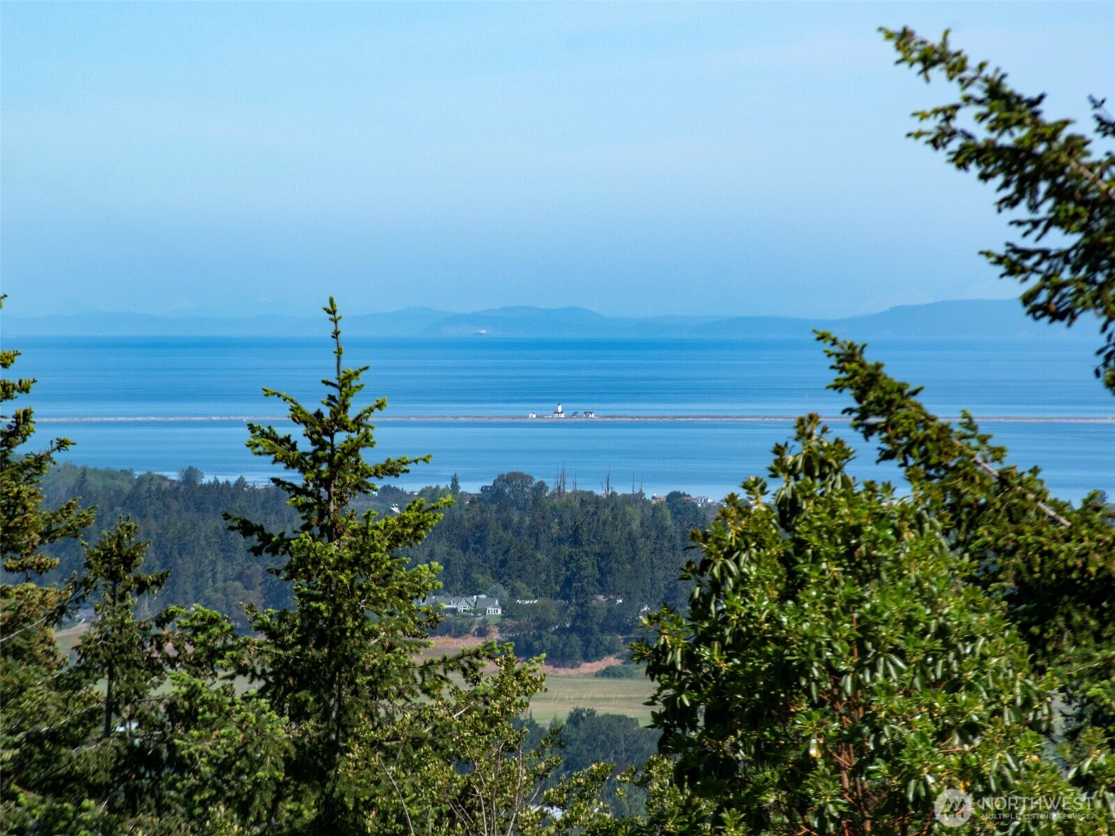 1 Owls Nest Road Sequim, WA 98382 - Photo 15 of 31 a view of ocean with a beach