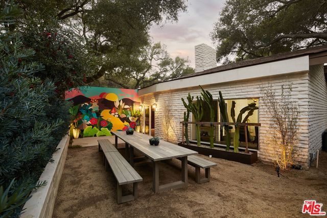 an outdoor space with furniture