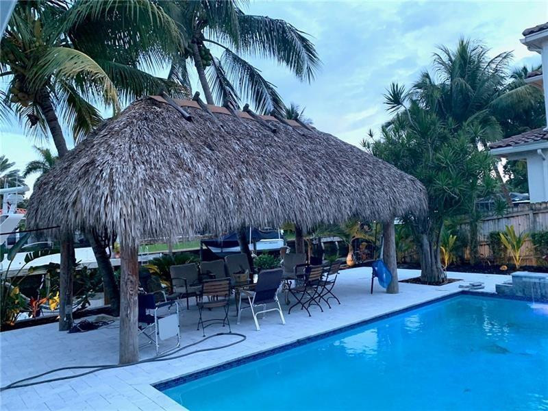 730 Northeast 69th Street Boca Raton, FL 33487 - Photo 29 of 32 a view of outdoor space yard and patio