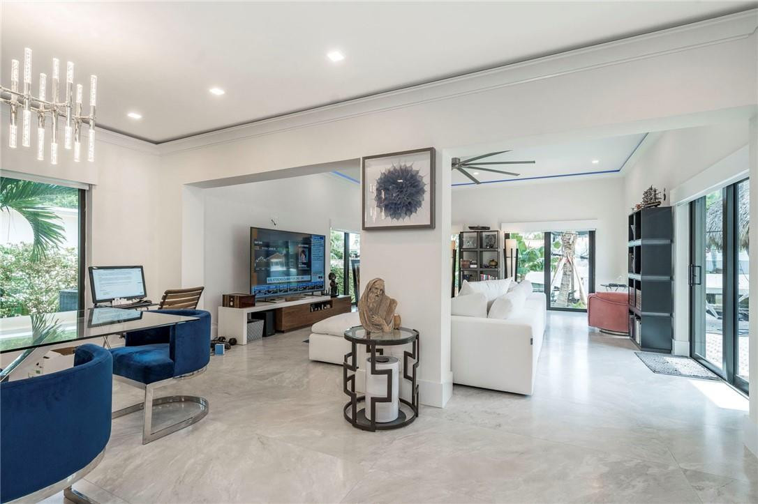 730 Northeast 69th Street Boca Raton, FL 33487 - Photo 8 of 32 a living room with furniture