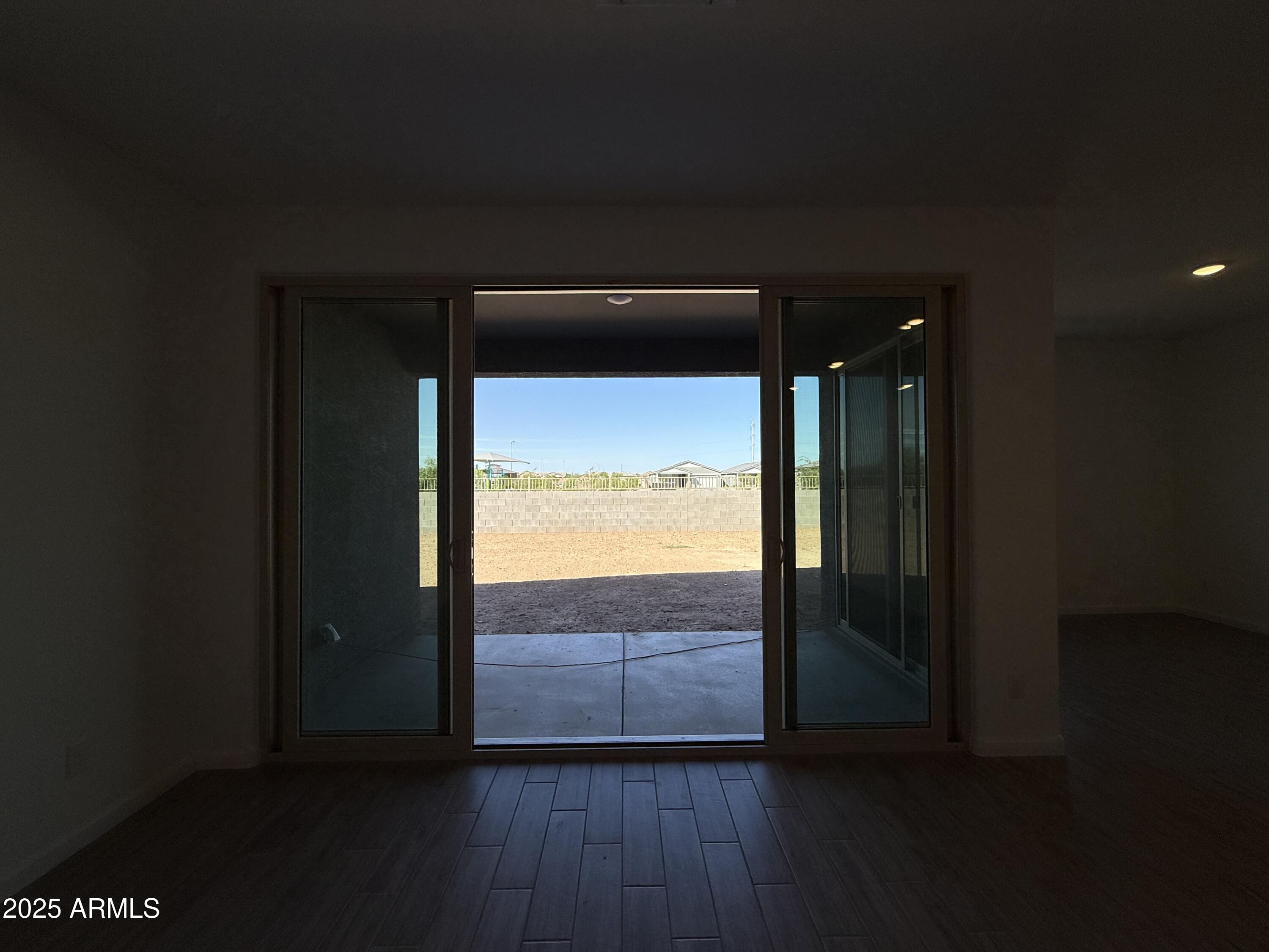 9628 West Tamarisk Avenue Tolleson, AZ 85353 - Photo 20 of 37 wooden floor in an empty room