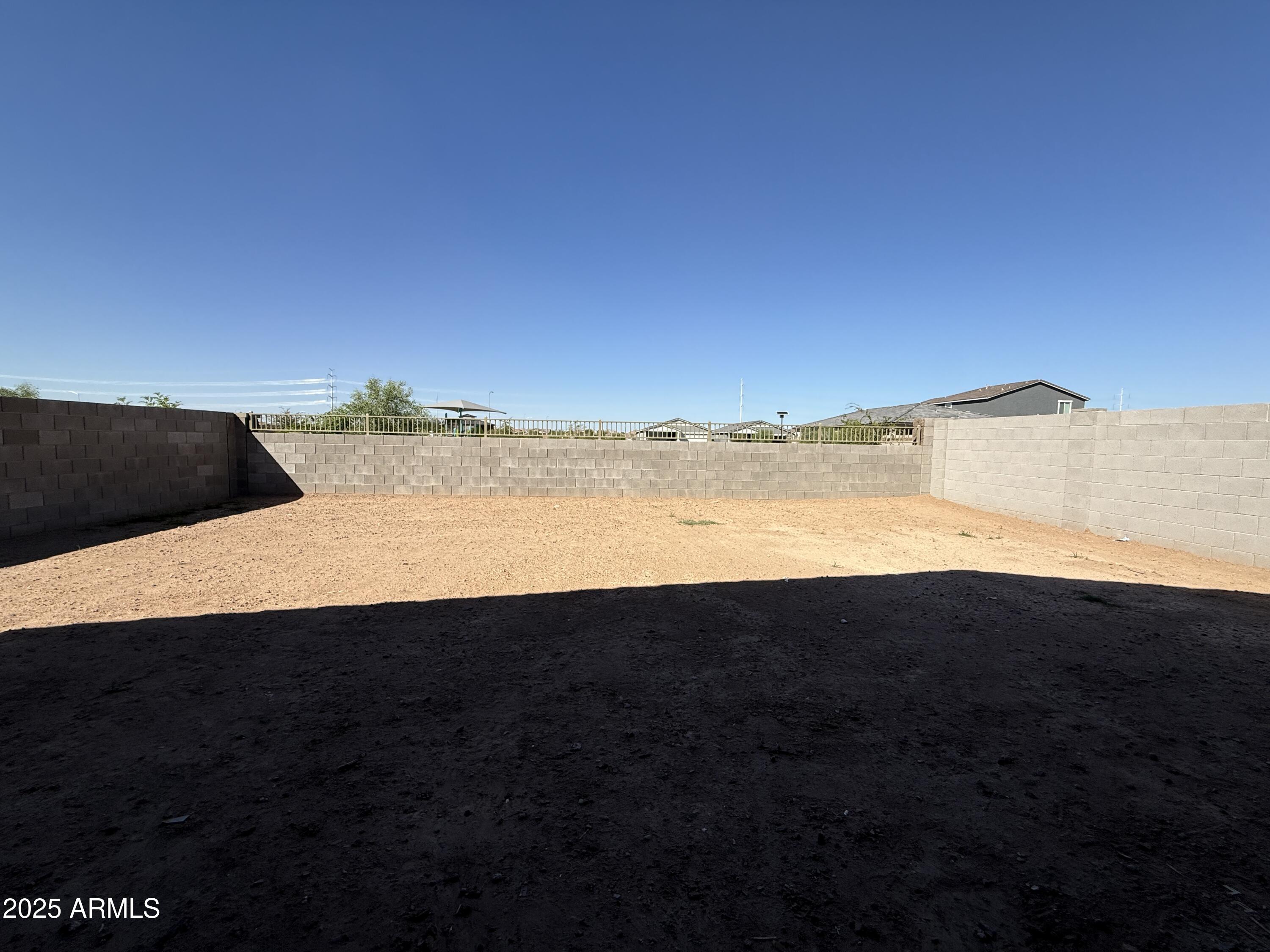 9628 West Tamarisk Avenue Tolleson, AZ 85353 - Photo 22 of 37 a view of an ocean and beach