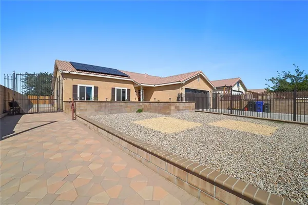 a house view with a outdoor space
