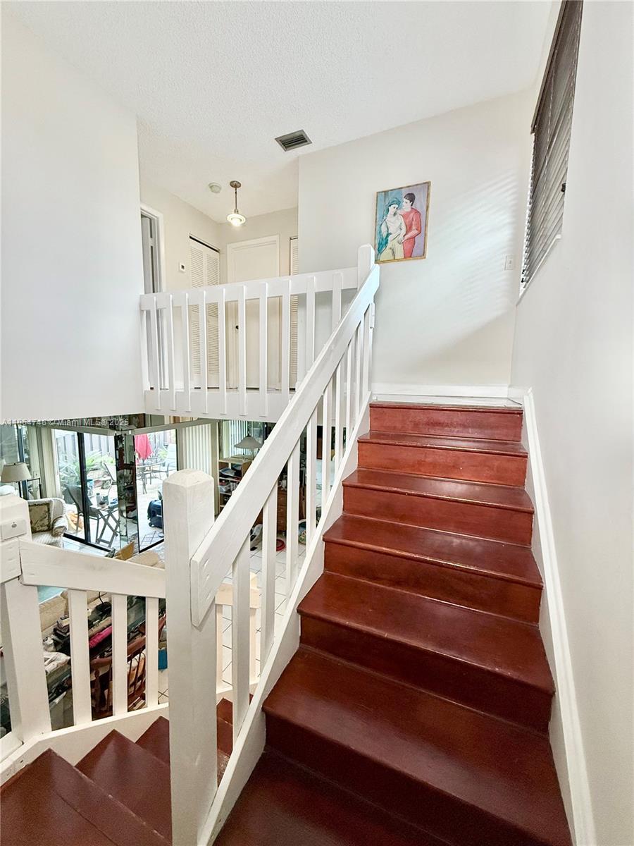 11028 Southwest 132nd Place, Unit 244 Miami, FL 33186 - Photo 13 of 25 a view of entryway and hall