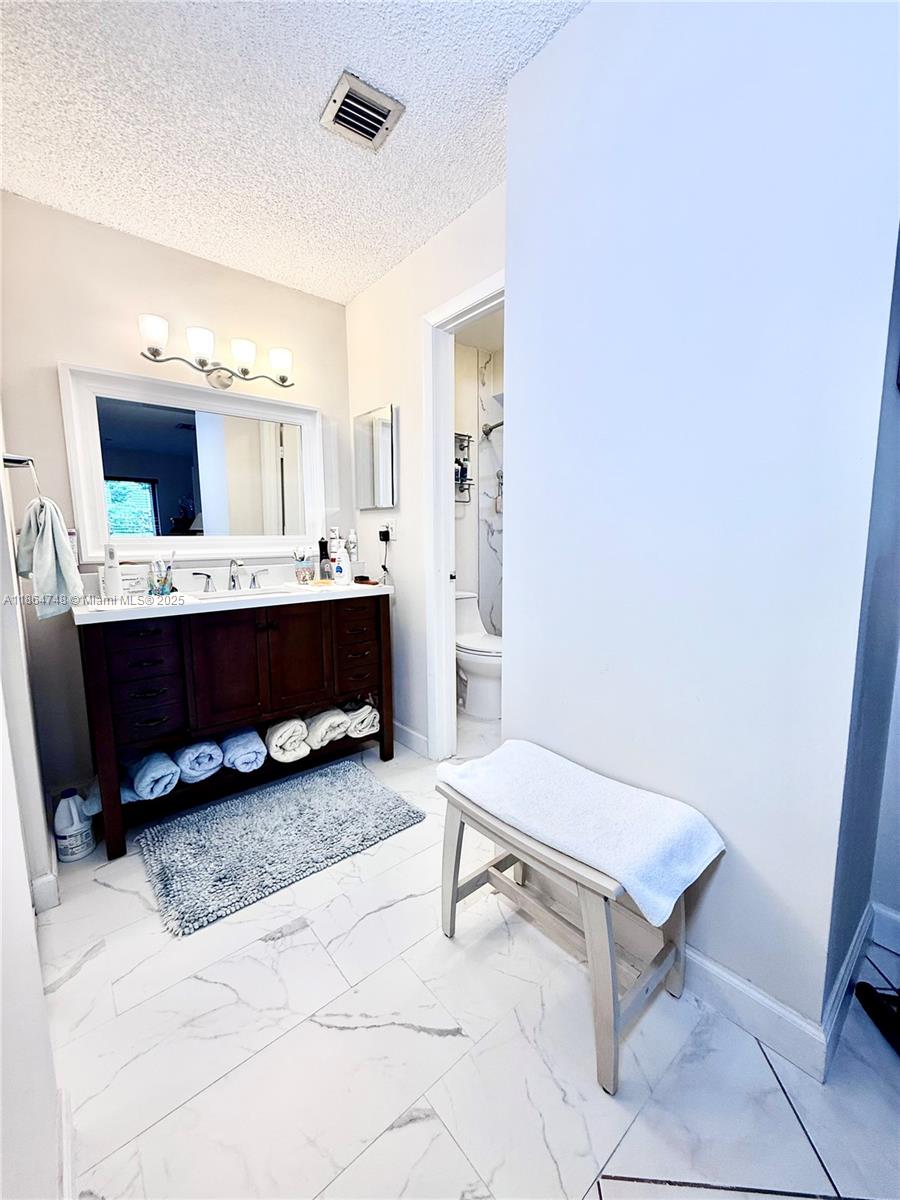 11028 Southwest 132nd Place, Unit 244 Miami, FL 33186 - Photo 18 of 25 a view of workspace with furniture and window