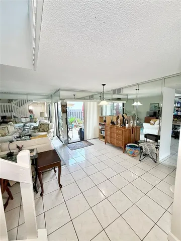 a room with lots of table and chairs