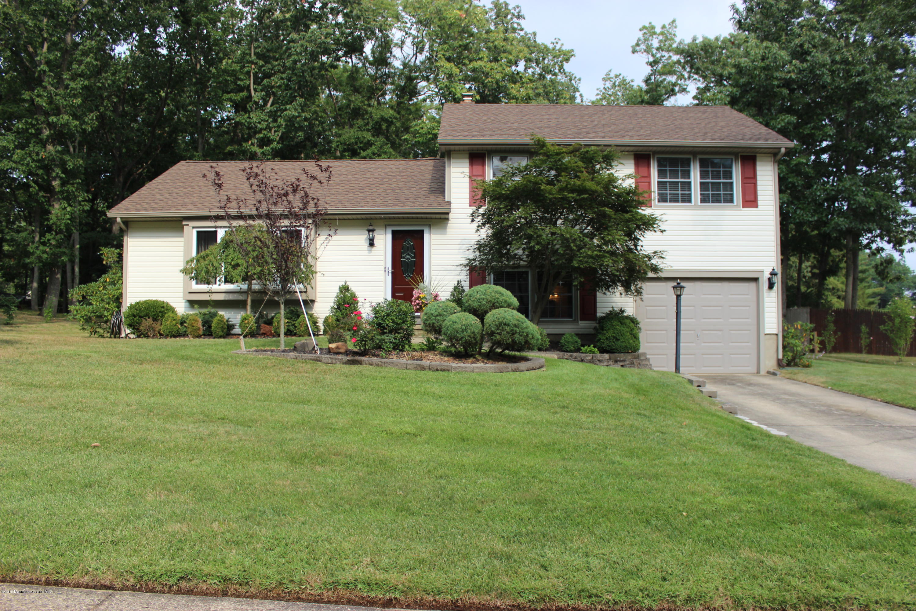 6 Buxton Road Jackson, NJ 08527 - Photo 1 of 41 a front view of a house with a yard