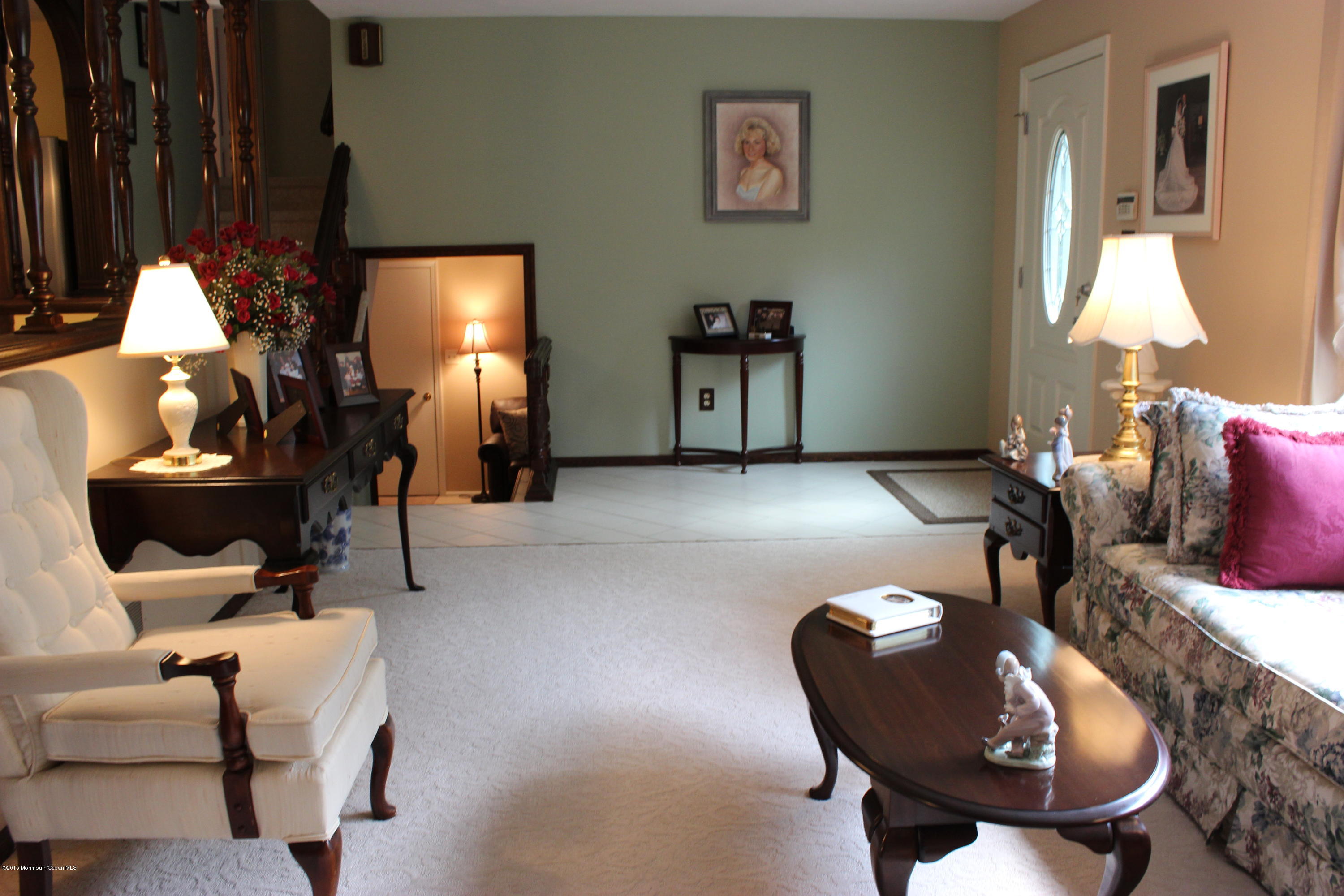 6 Buxton Road Jackson, NJ 08527 - Photo 18 of 41 a living room with furniture and a lamp