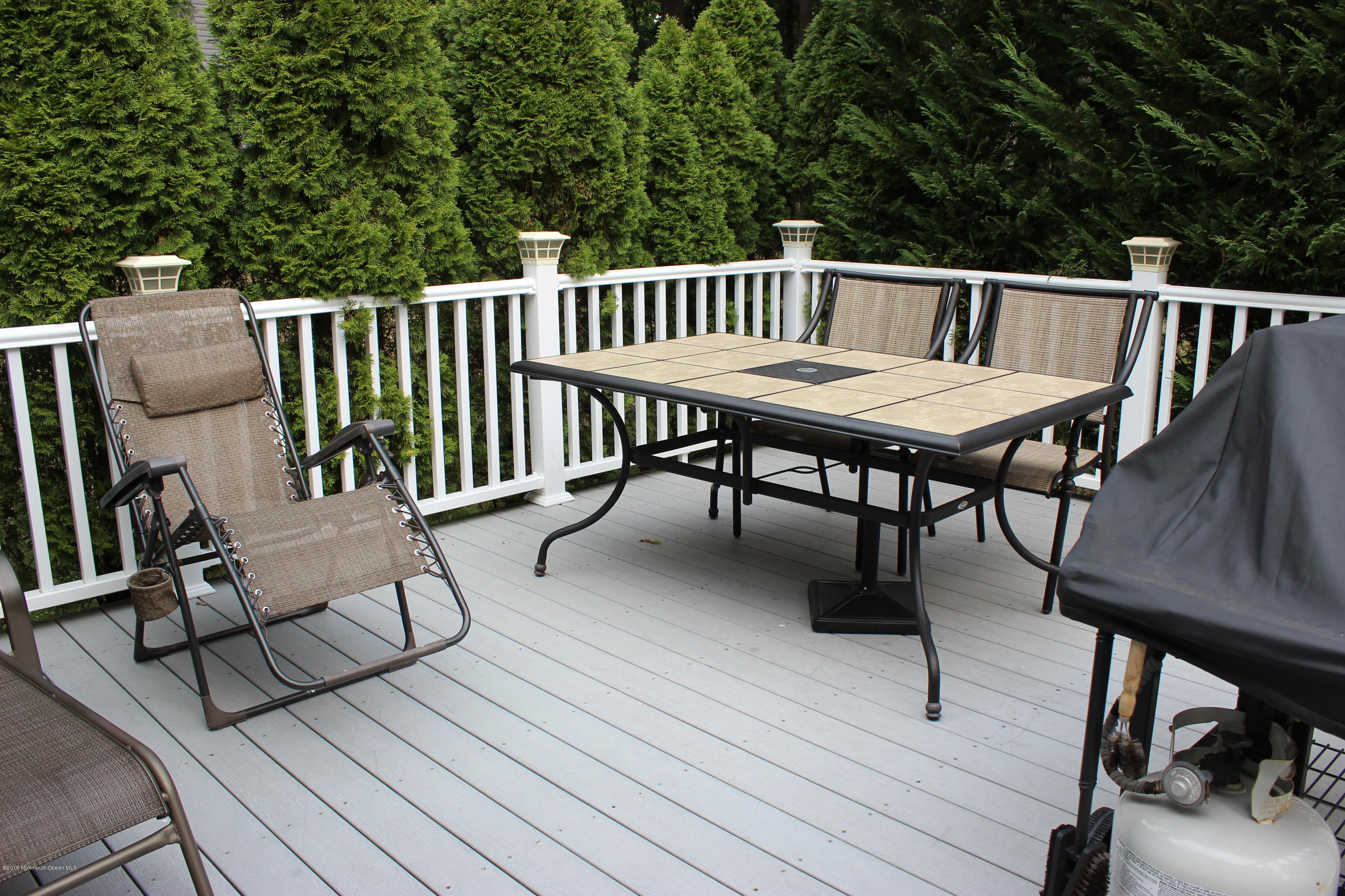 6 Buxton Road Jackson, NJ 08527 - Photo 34 of 41 a view of balcony with wooden floor and outdoor seating