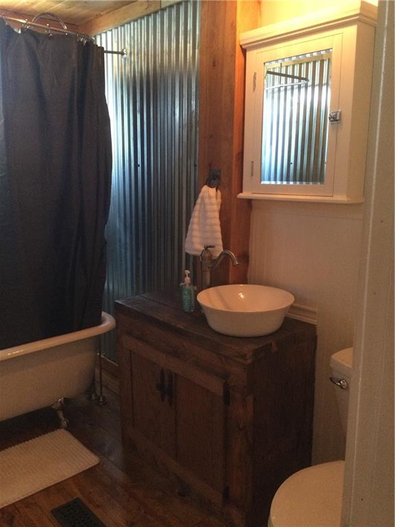 109 Woodies Road Waynesburg, PA 15370 - Photo 13 of 33 a bathroom with a sink toilet and a mirror
