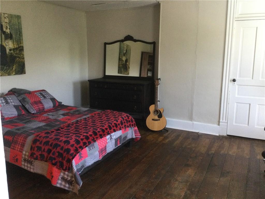 109 Woodies Road Waynesburg, PA 15370 - Photo 21 of 33 a bedroom with a bed and dresser
