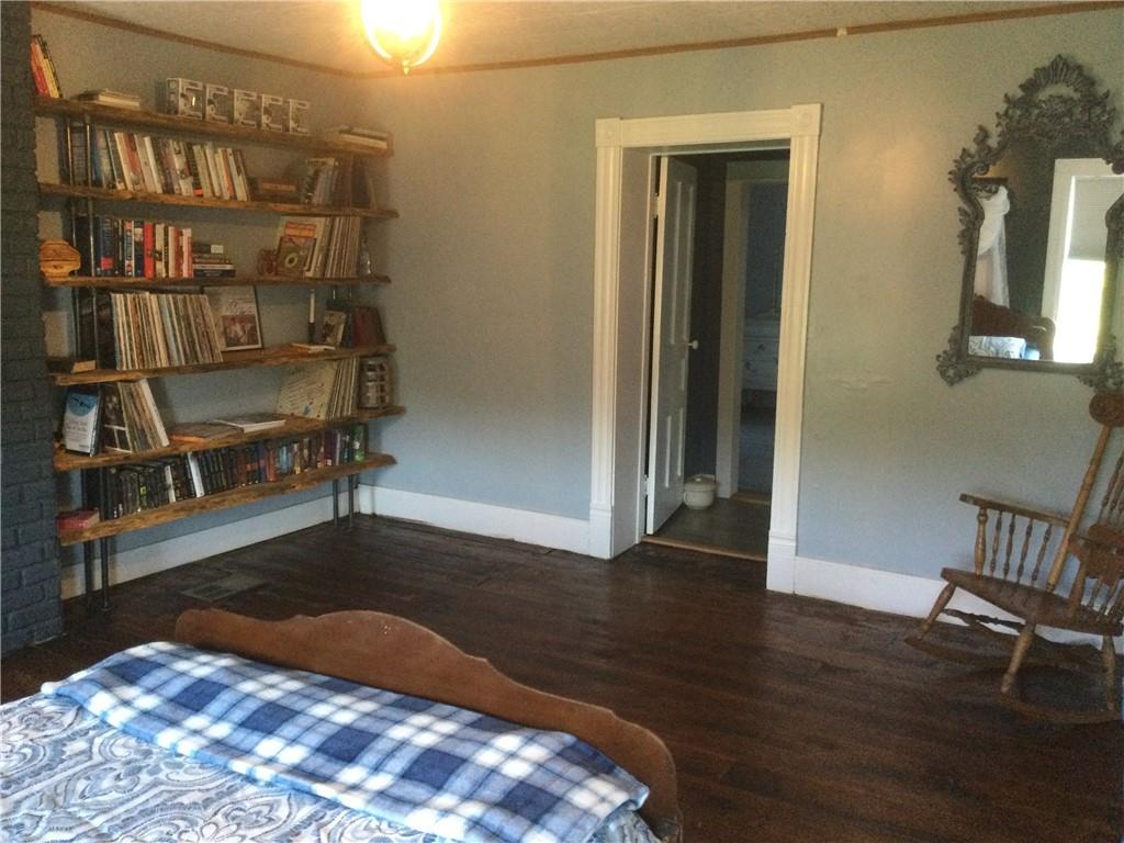 109 Woodies Road Waynesburg, PA 15370 - Photo 23 of 33 an empty room with wooden floor and closet