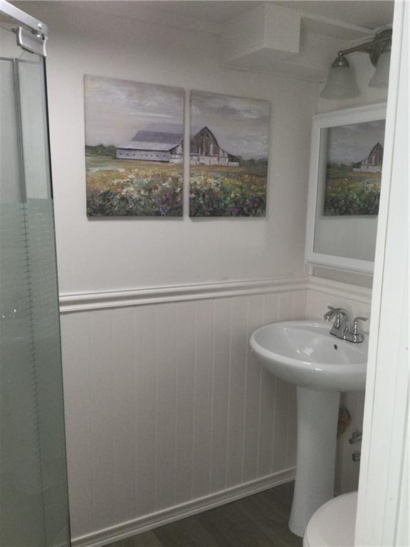 109 Woodies Road Waynesburg, PA 15370 - Photo 27 of 33 a bathroom with a toilet sink and mirror