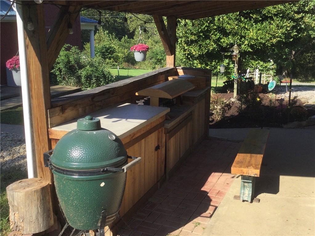 109 Woodies Road Waynesburg, PA 15370 - Photo 30 of 33 a living room with furniture and a floor to ceiling window