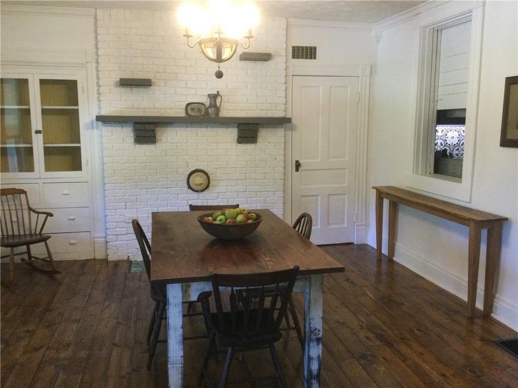 109 Woodies Road Waynesburg, PA 15370 - Photo 4 of 33 a view of a dining room with furniture and wooden floor