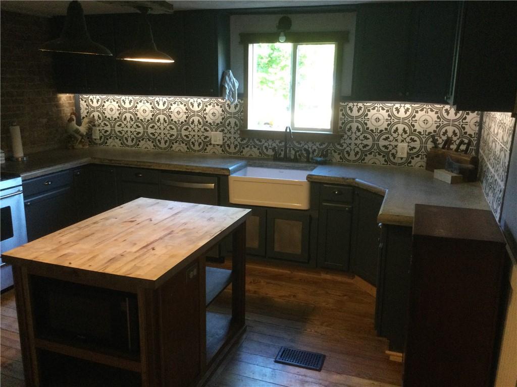 109 Woodies Road Waynesburg, PA 15370 - Photo 7 of 33 a kitchen with stainless steel appliances kitchen island sink and window