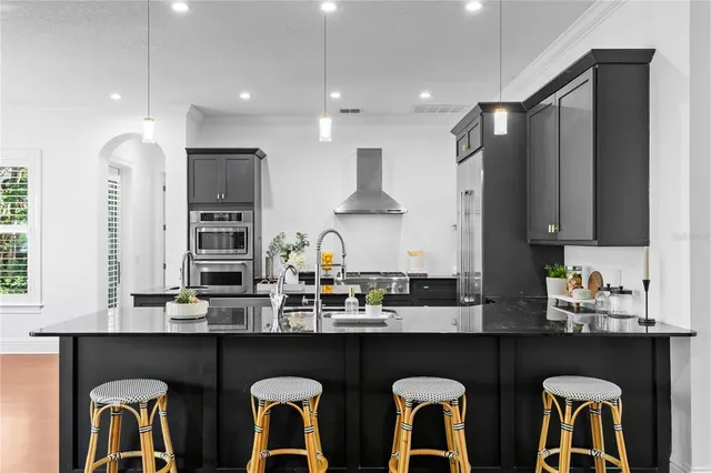 a kitchen with lots of counter space and a sink