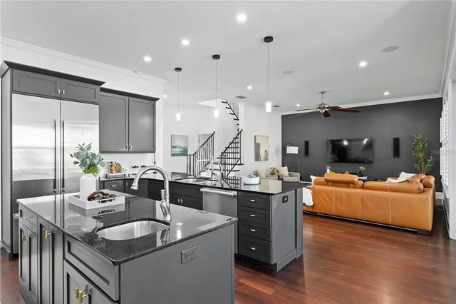 a dining room with furniture and windows