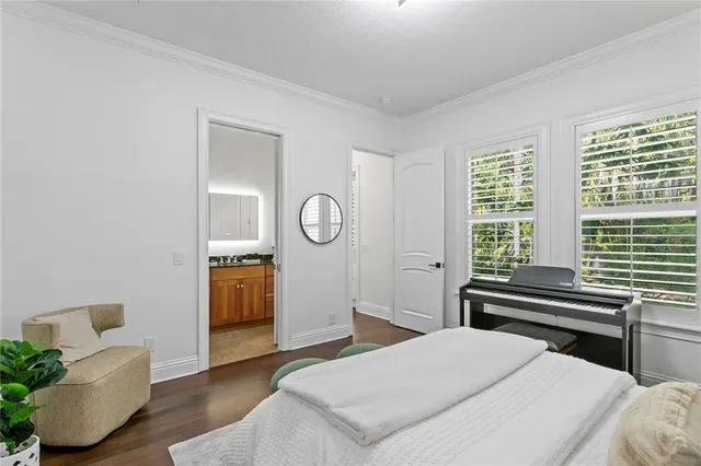 a view of entryway with wooden floor and stairs