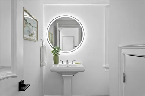 a view of hallway with wooden floor