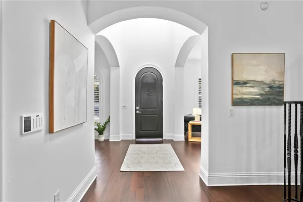 a view of outdoor space window and hardwood floor
