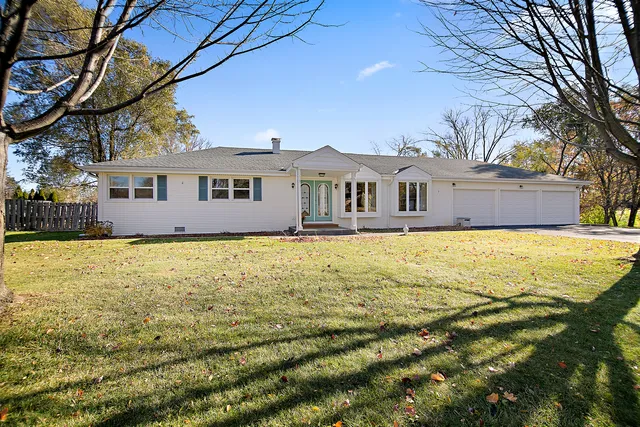 a front view of a house with swimming pool