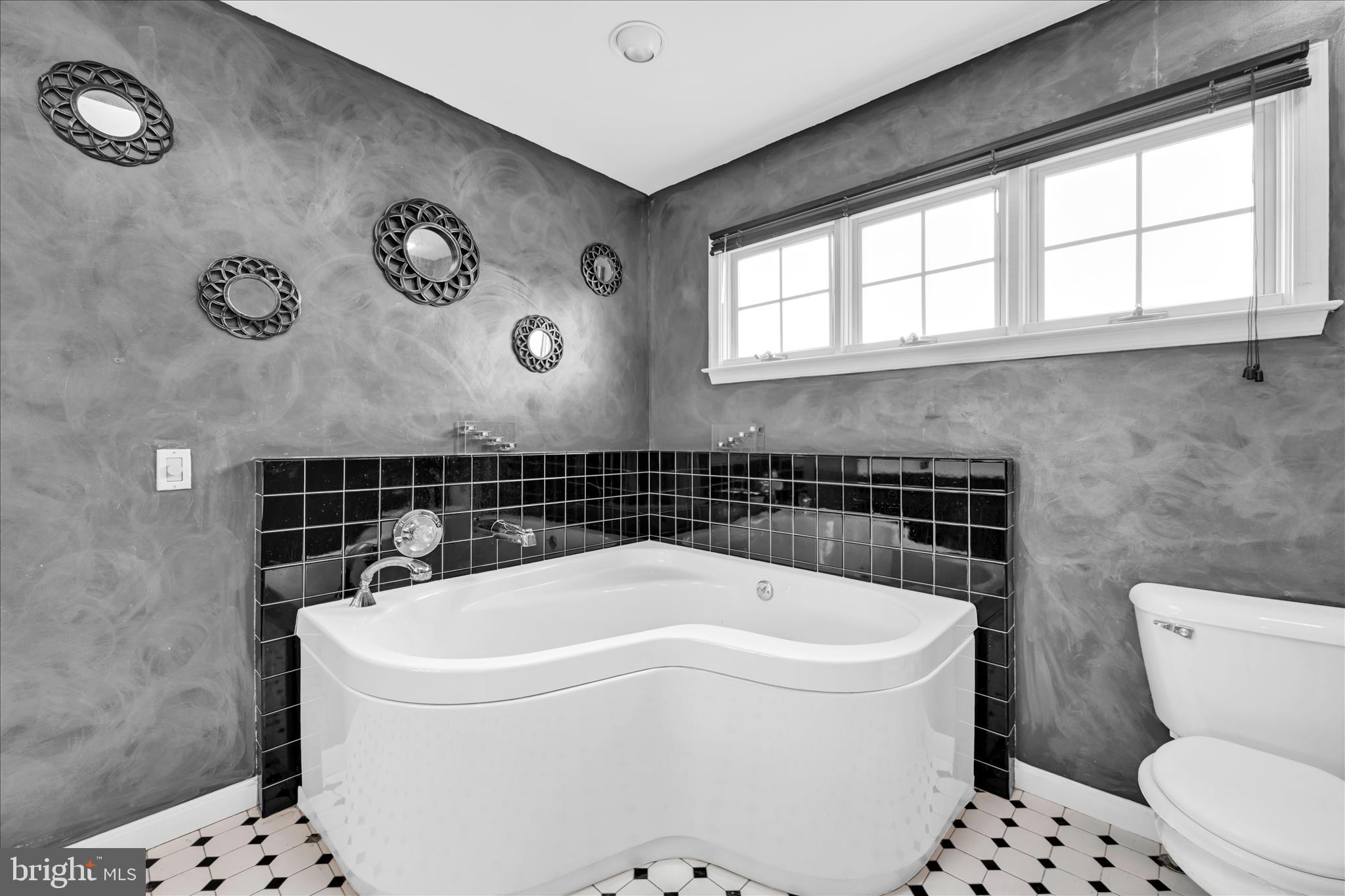 1602 Churchill Road Harrisburg, PA 17111 - Photo 30 of 61 a bathroom with a bathtub and a toilet