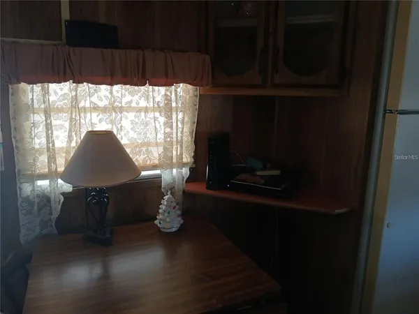 a room with furniture and a window