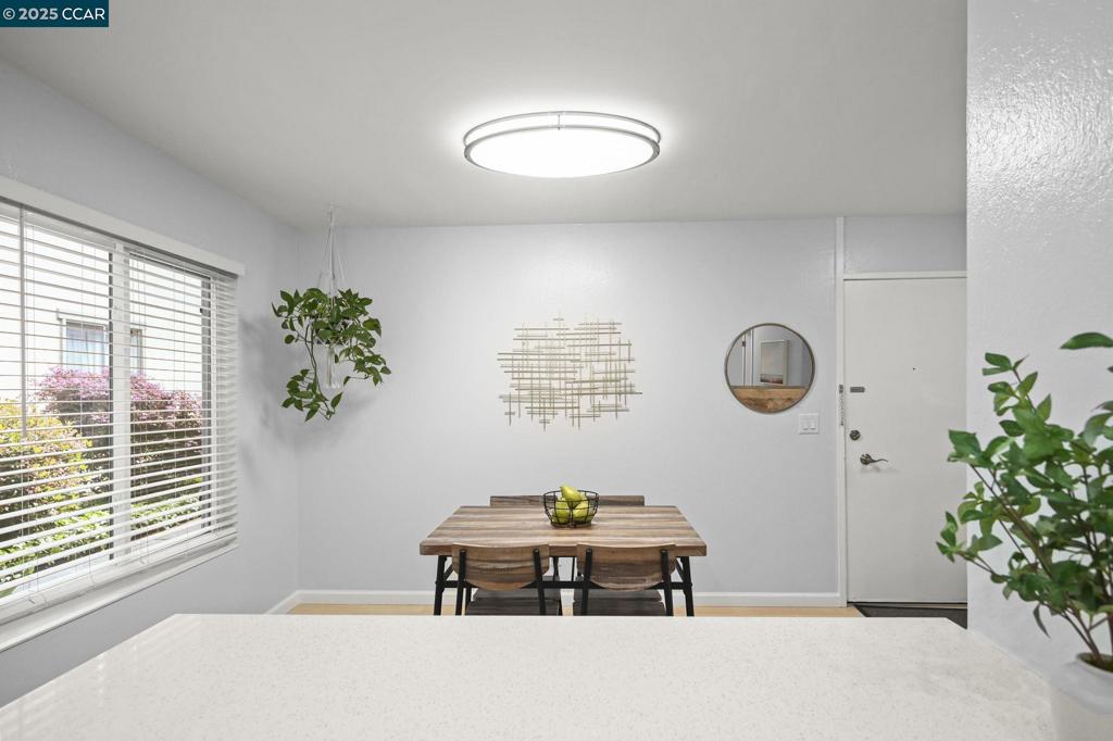 2560 Walnut Boulevard Walnut Creek, CA 94596 - Photo 11 of 29 a view of a bedroom with a window and a chandelier