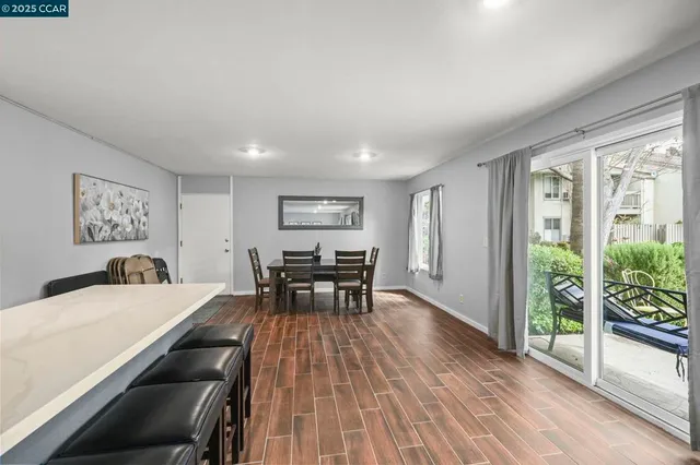 a bathroom with a sink toilet and mirror