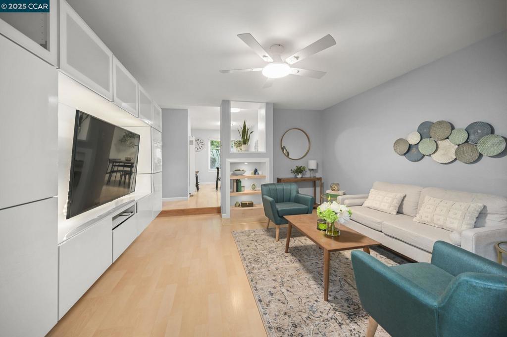 2560 Walnut Boulevard Walnut Creek, CA 94596 - Photo 3 of 29 a living room with furniture and a fireplace