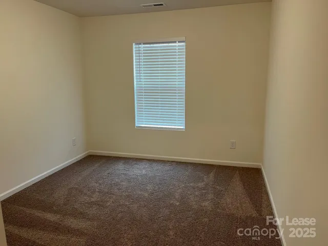 an empty room with a workbench