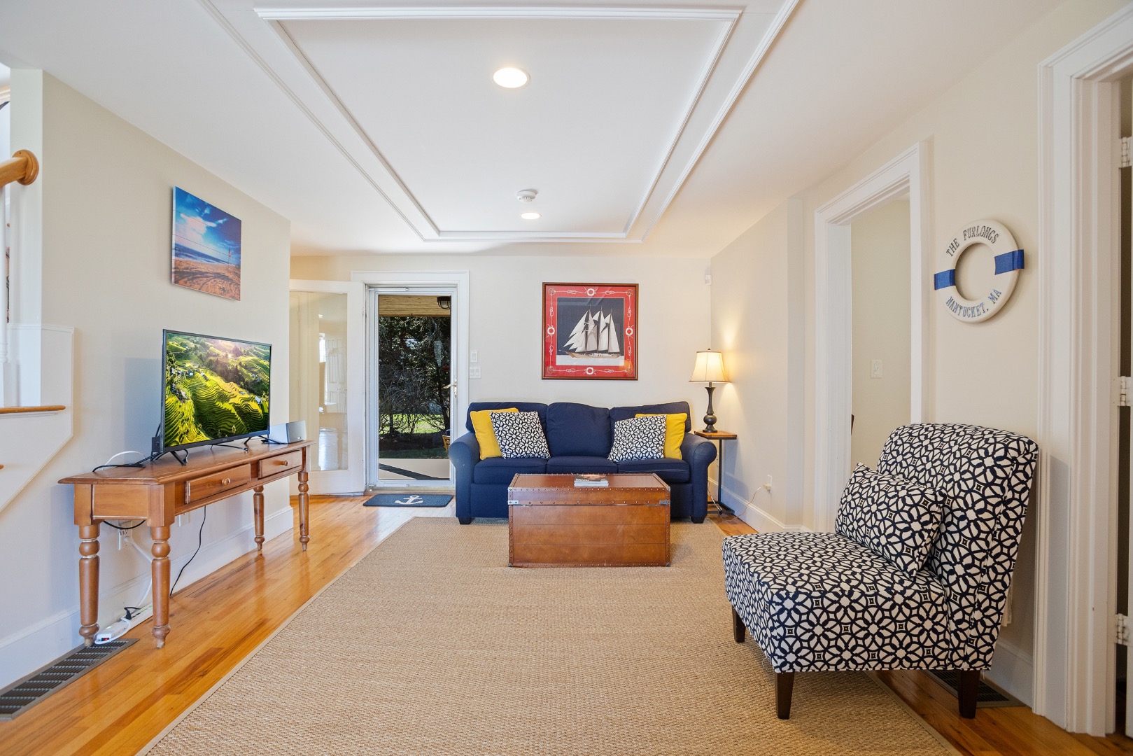 3 Chatham Road Nantucket, MA 02554 - Photo 17 of 37 a living room with furniture and a flat screen tv