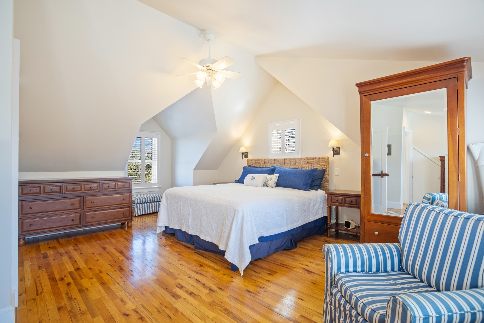 3 Chatham Road Nantucket, MA 02554 - Photo 19 of 37 a bedroom with bed and wooden floor