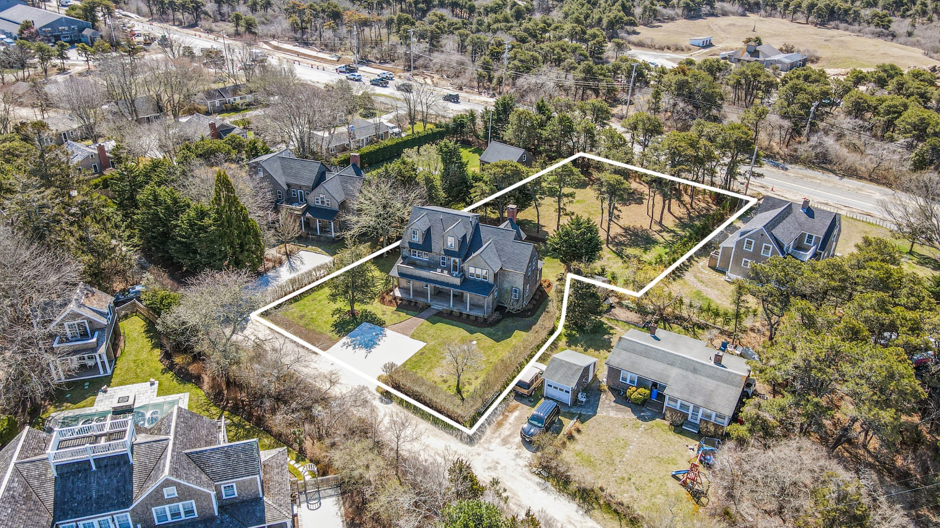 3 Chatham Road Nantucket, MA 02554 - Photo 3 of 37 an aerial view of a house with a swimming pool