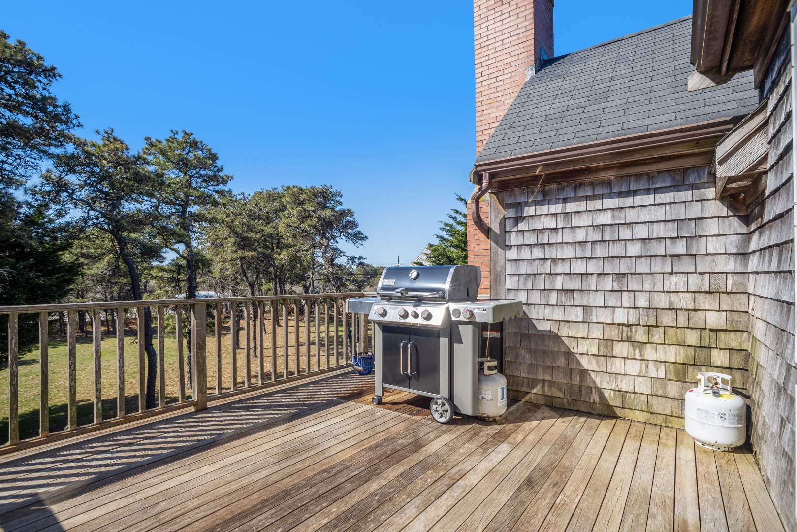 3 Chatham Road Nantucket, MA 02554 - Photo 31 of 37 a view of a balcony with wooden floor and fence