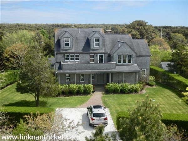 3 Chatham Road Nantucket, MA 02554 - Photo 35 of 37 a front view of a house with a yard