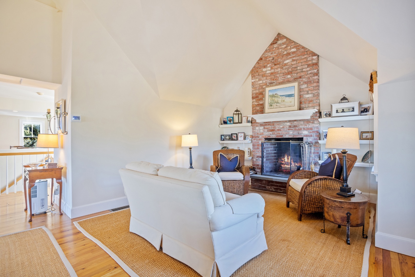 3 Chatham Road Nantucket, MA 02554 - Photo 5 of 37 a living room with furniture a fireplace and a table