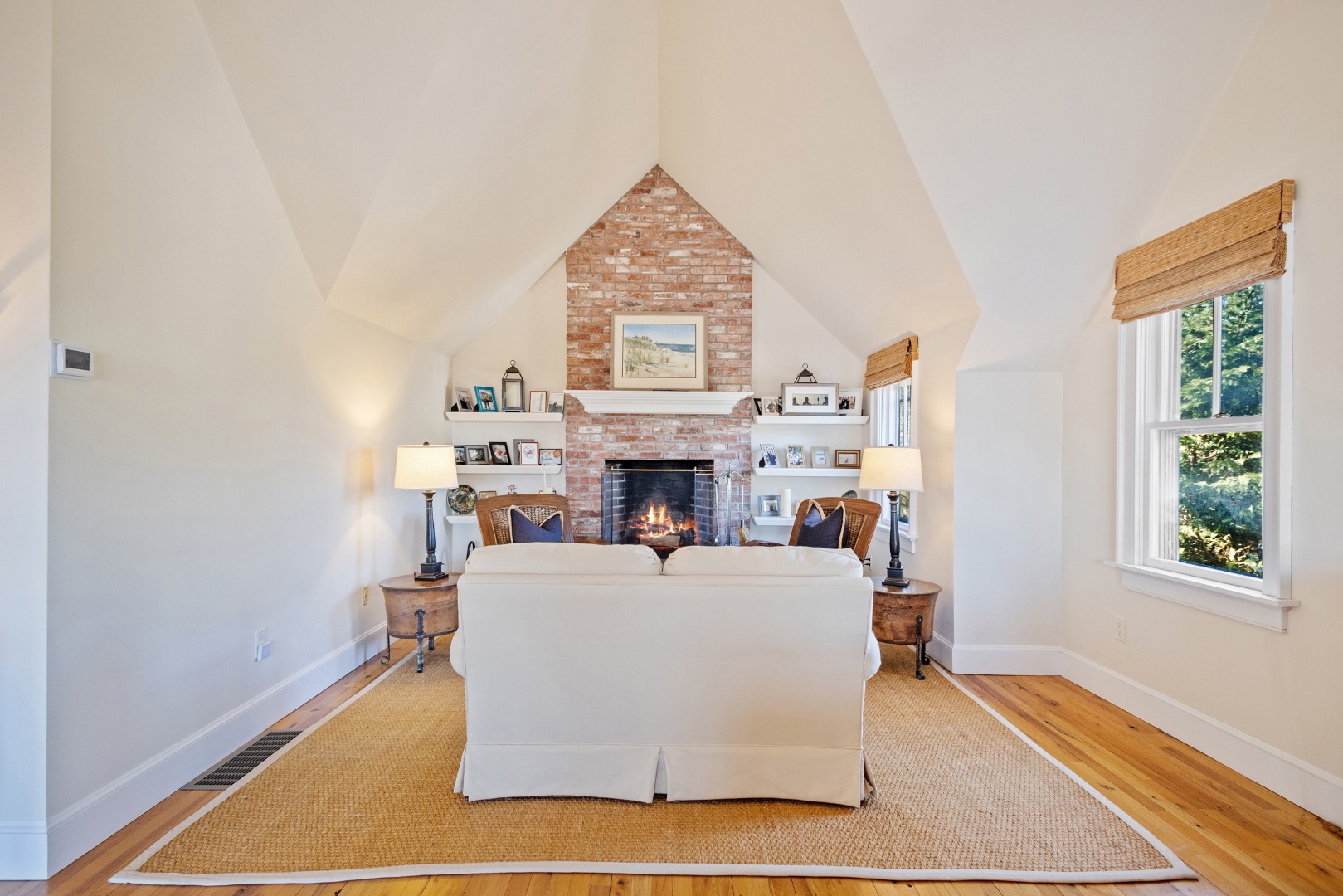 3 Chatham Road Nantucket, MA 02554 - Photo 6 of 37 a living room with furniture a window and a fireplace
