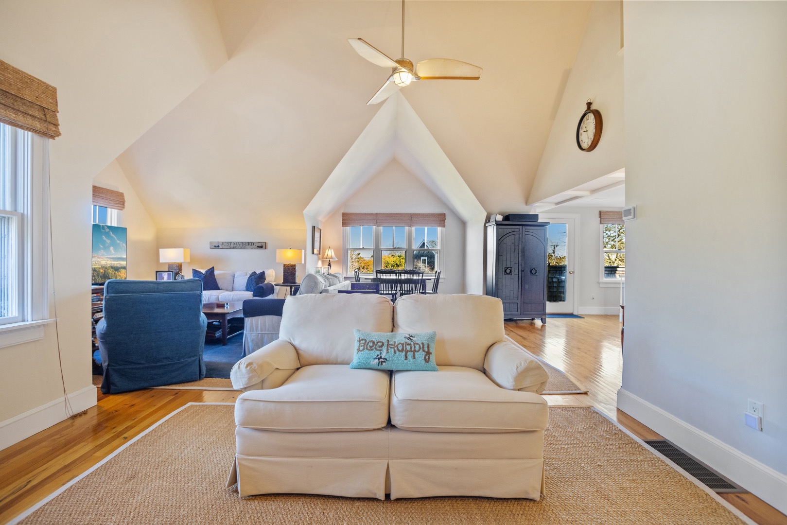 3 Chatham Road Nantucket, MA 02554 - Photo 7 of 37 a living room with furniture a dining table and a chandelier