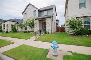 473 Chambers Place Fairview, TX 75069 - Photo 4 of 20 a front view of a house with garden