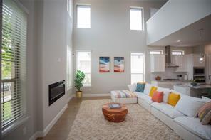 473 Chambers Place Fairview, TX 75069 - Photo 7 of 20 a living room with furniture and a flat screen tv