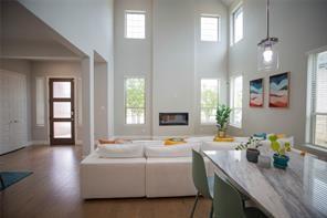 473 Chambers Place Fairview, TX 75069 - Photo 9 of 20 a living room with furniture and wooden floor