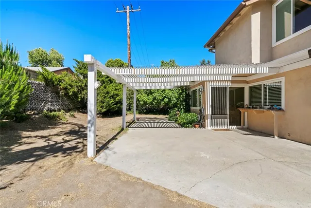 a house with yard in front of it