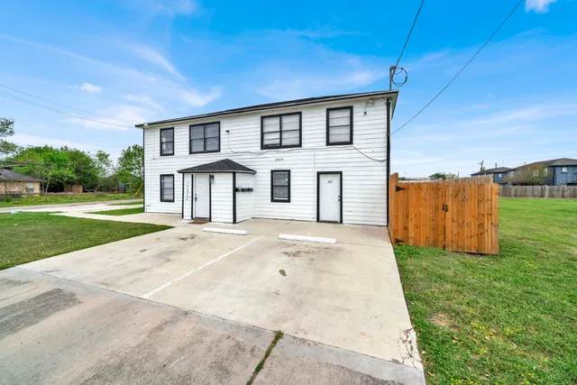 a house view with a garden space