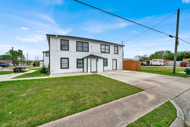 a house view with a garden space