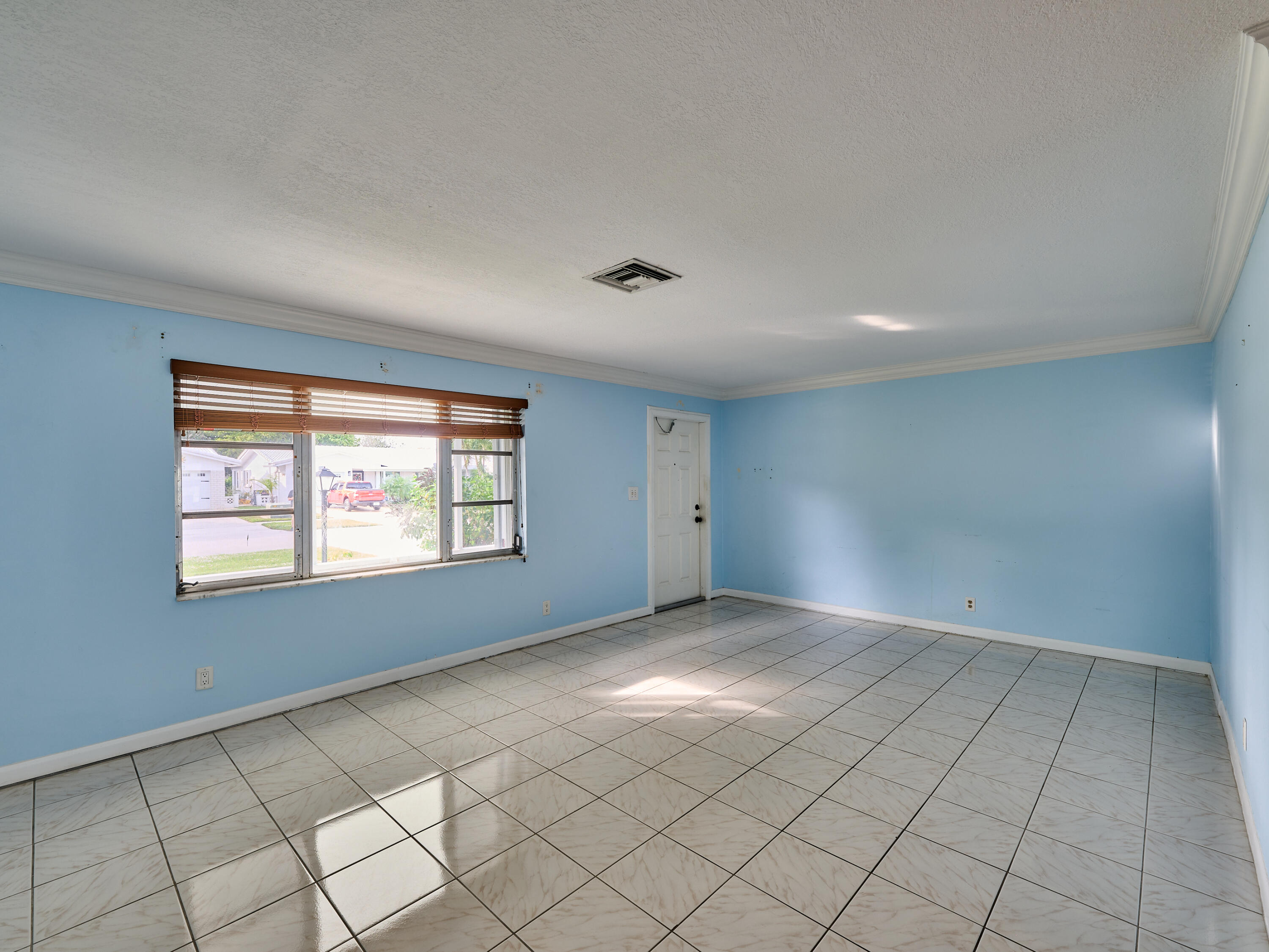 1710 Southwest 22nd Street Boynton Beach, FL 33426 - Photo 11 of 81 Front Door/Living Room