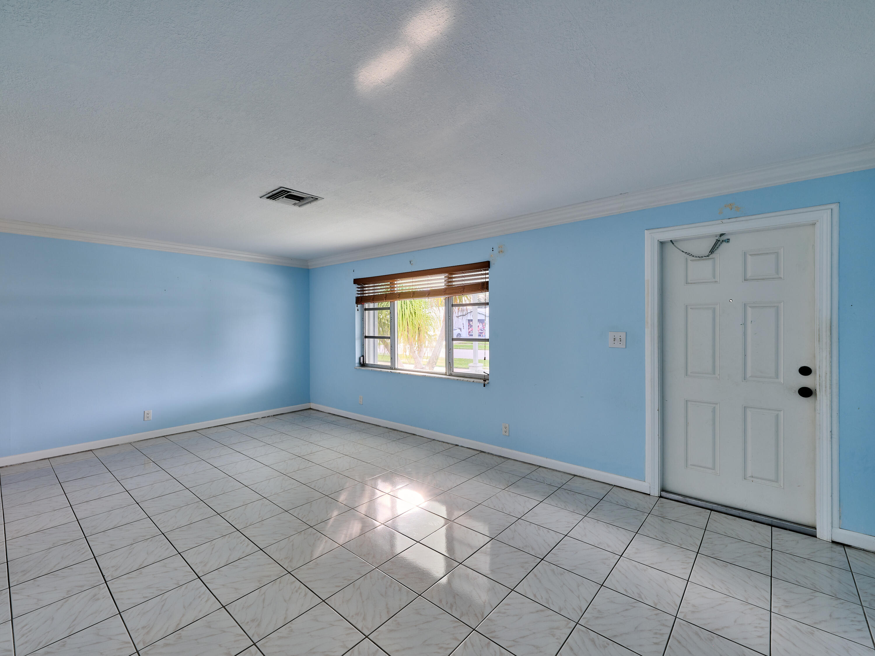 1710 Southwest 22nd Street Boynton Beach, FL 33426 - Photo 12 of 81 Living Room/Front door